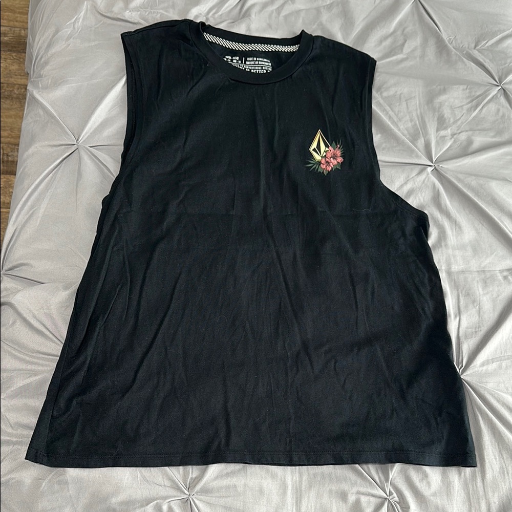 Like new women's Volcom Black Sleeveless Muscle Tee with Floral Logo